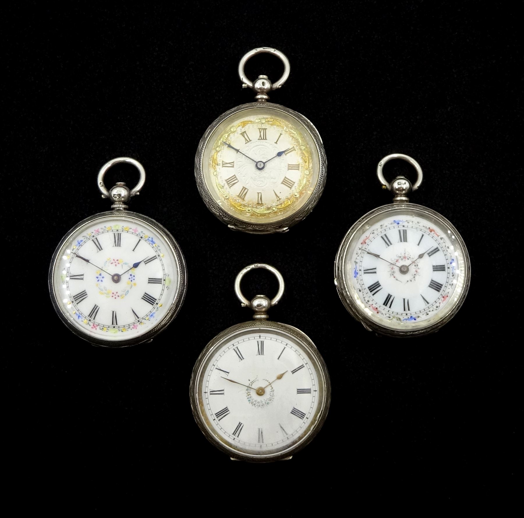 Four 19th/early 20th century silver open face ladies cylinder pocket watches, white enamel and silve