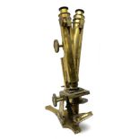 Victorian lacquered brass binocular microscope by R. & J. Beck with rack and pinion and fine focusin