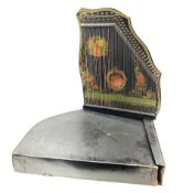 Late 19th/early 20th century zither of typical ebonised form decorated with a panel of a lady playin