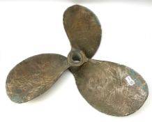 Large and heavy ship's brass three-blade propeller