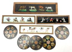 Three early 19th century wood framed glass panoramic magic lantern slides