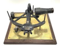 Henry Hughes & Son 'Husun' black finished brass sextant marked H (broad arrow) O No.336; mounted on
