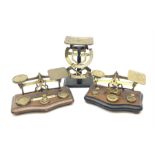 Pair of German Jacob Maul bilateral brass and black enamel postal scales H16cm; and two sets of bras