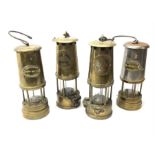 Four miner's lamps - two all brass by The Protector Lamp & Lighting Co. Ltd.H25cm; and two (one all