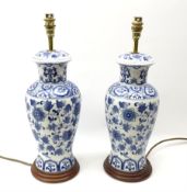 A pair of blue and white Oriental style table lamps