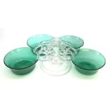 A set of four early 19th century Bristol green glass finger bowls