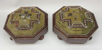 A pair of Victorian walnut and beadwork footstools