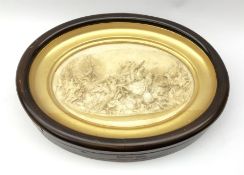 19th century oval plaster relief plaque depicting a battle scene