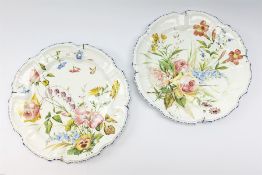 A pair of Italian faience pottery plates, by Giovanni Battista Viero, each of circular form with pie