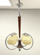 An Art Deco style four branch ceiling light fitting with marbled effect glass shades