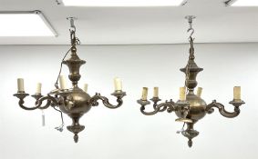 A pair of bronzed six branch chandeliers of Dutch 17th century style