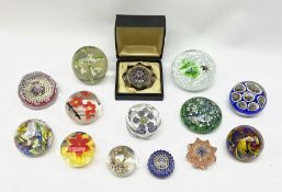 A group of paperweights