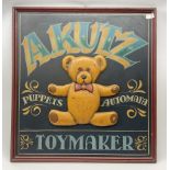 A Kutz Toymaker sign with central low relief decoration of a teddy bear