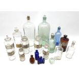 A collection of apothecary bottles