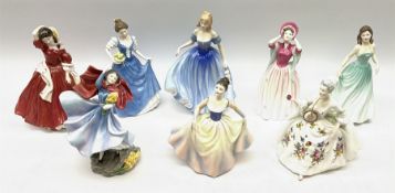 Eight Royal Doulton figures