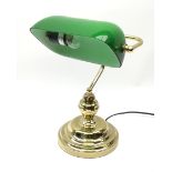 A brass bankers desk lamp