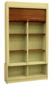 Large early 20th century pine cabinet with tambour front enclosing six adjustable shelves above two
