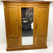 Early 20th century ash triple wardrobe projecting cornice