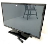 Samsung PS43F4500 television with remote control