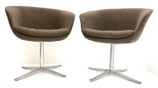 Pair Person Lloyd for Walter Knole swivel turtle chairs on polished metal supports