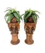 Pair of hardwood elephant carved columns