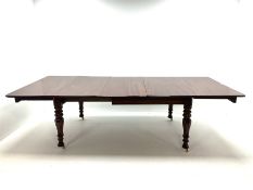 Victorian mahogany extending dining table with three leaves