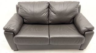 Two seat leather upholstered sofa bed