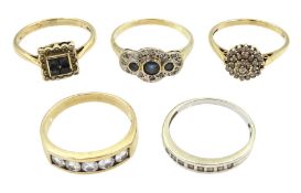 Five 9ct gold stone set rings including two sapphire and diamond rings
