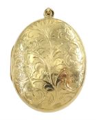 9ct gold oval locket with engraved decoration