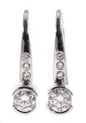 Pair of 18ct white gold diamond pendant half bezel set earrings