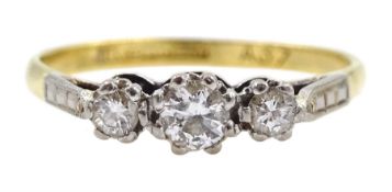 Gold three stone old cut diamond ring