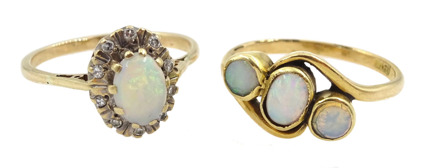 Gold three stone opal ring