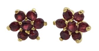 Pair of 9ct gold garnet flower stud earrings