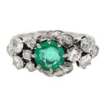 White gold round emerald and diamond cluster ring