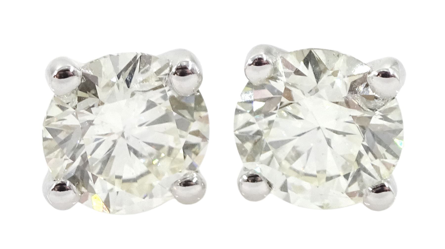 Pair of 18ct white gold brilliant cut diamond stud earrings