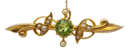 Edwardian gold peridot and split seed pearl bar brooch stamped 15ct