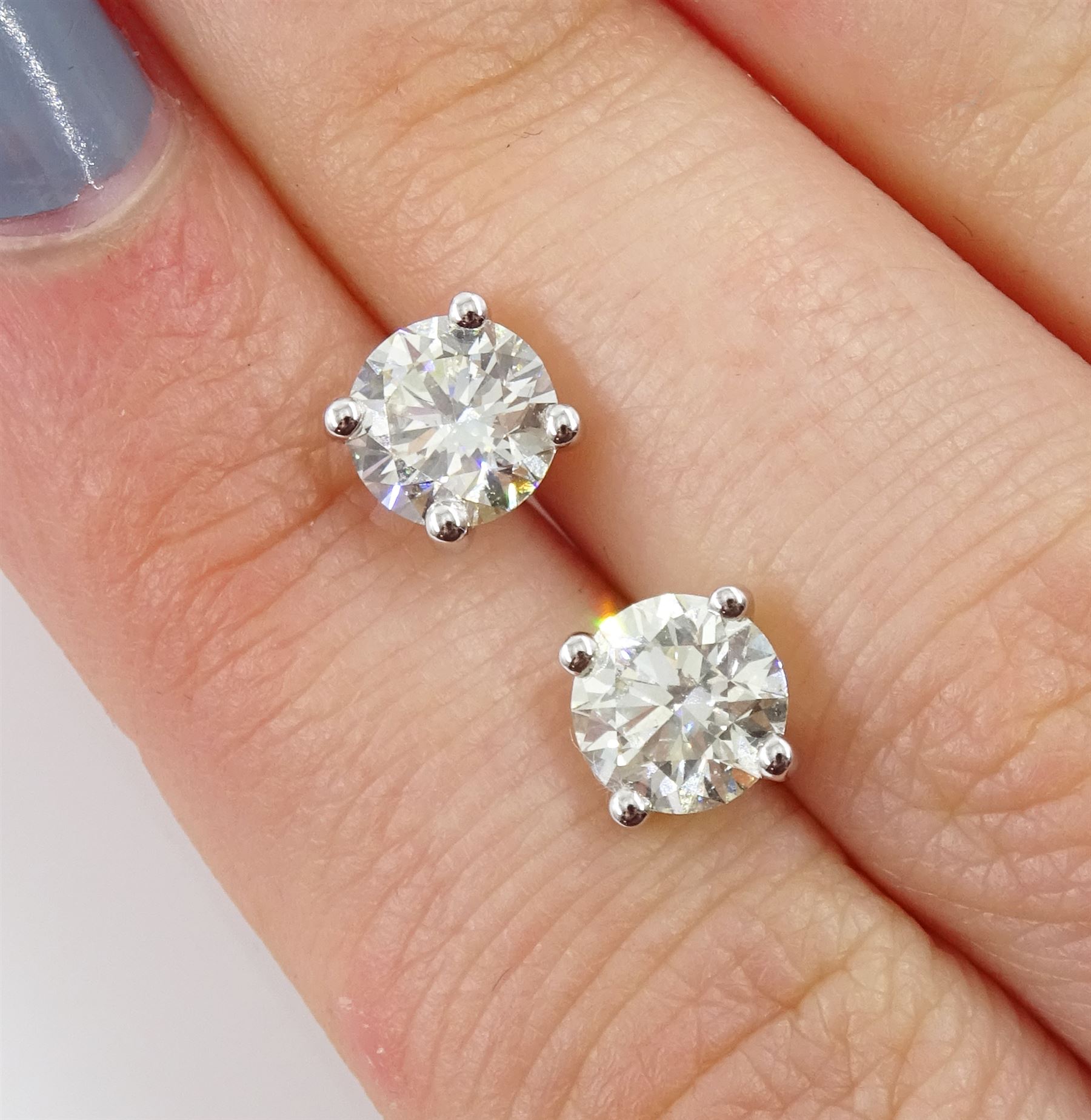 Pair of 18ct white gold brilliant cut diamond stud earrings - Image 3 of 3