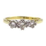 Gold three stone diamond ring