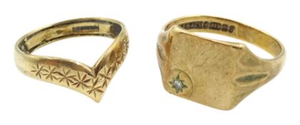 Gold signet ring set with a diamond and a gold wishbone ring