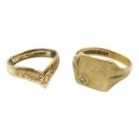 Gold signet ring set with a diamond and a gold wishbone ring