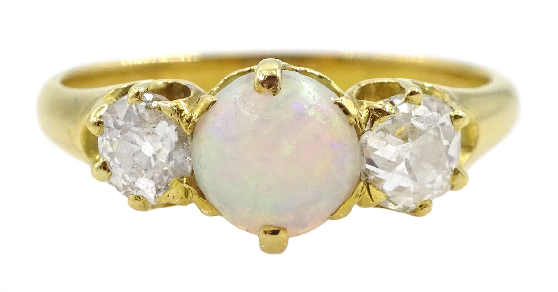 Gold three stone round opal and old cut diamond ring