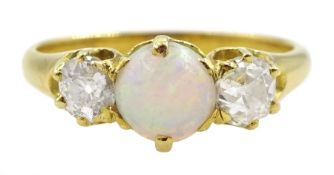 Gold three stone round opal and old cut diamond ring