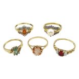 Five 9ct gold stone set rings including pearl and tanzanite