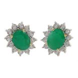 Pair of 9ct gold oval emerald and diamond cluster stud earring