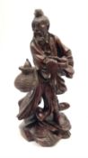 A Chinese carved hardwood figure