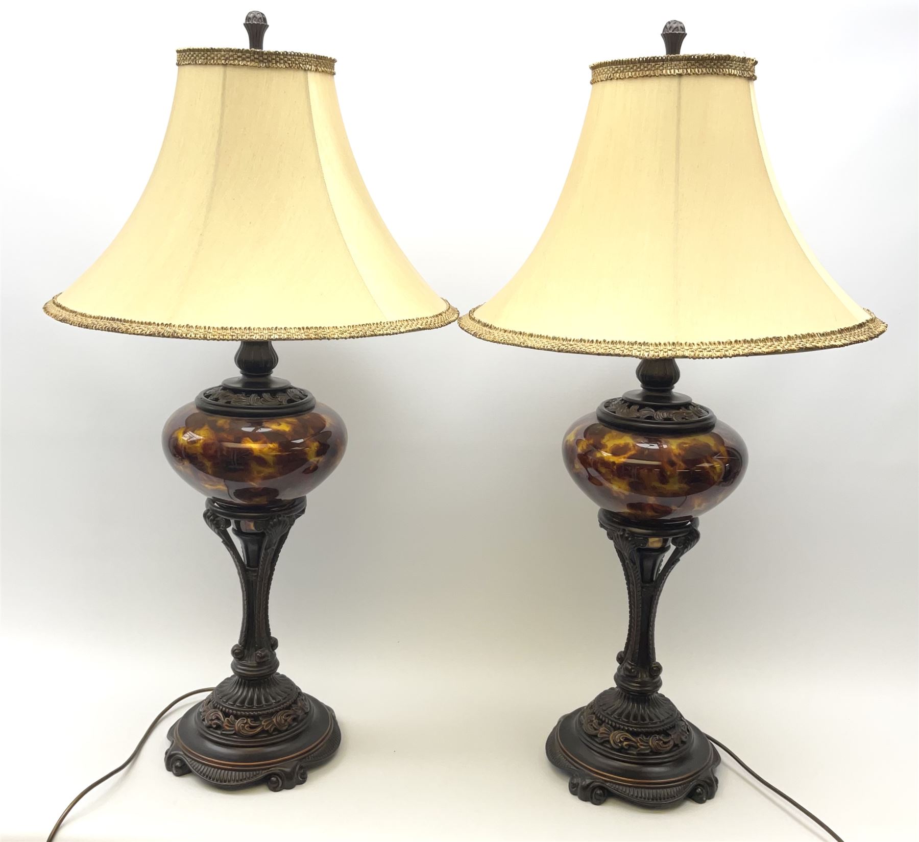 Two large bronzed composite table lamps