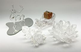 A group of four Swarovski Crystal ornaments