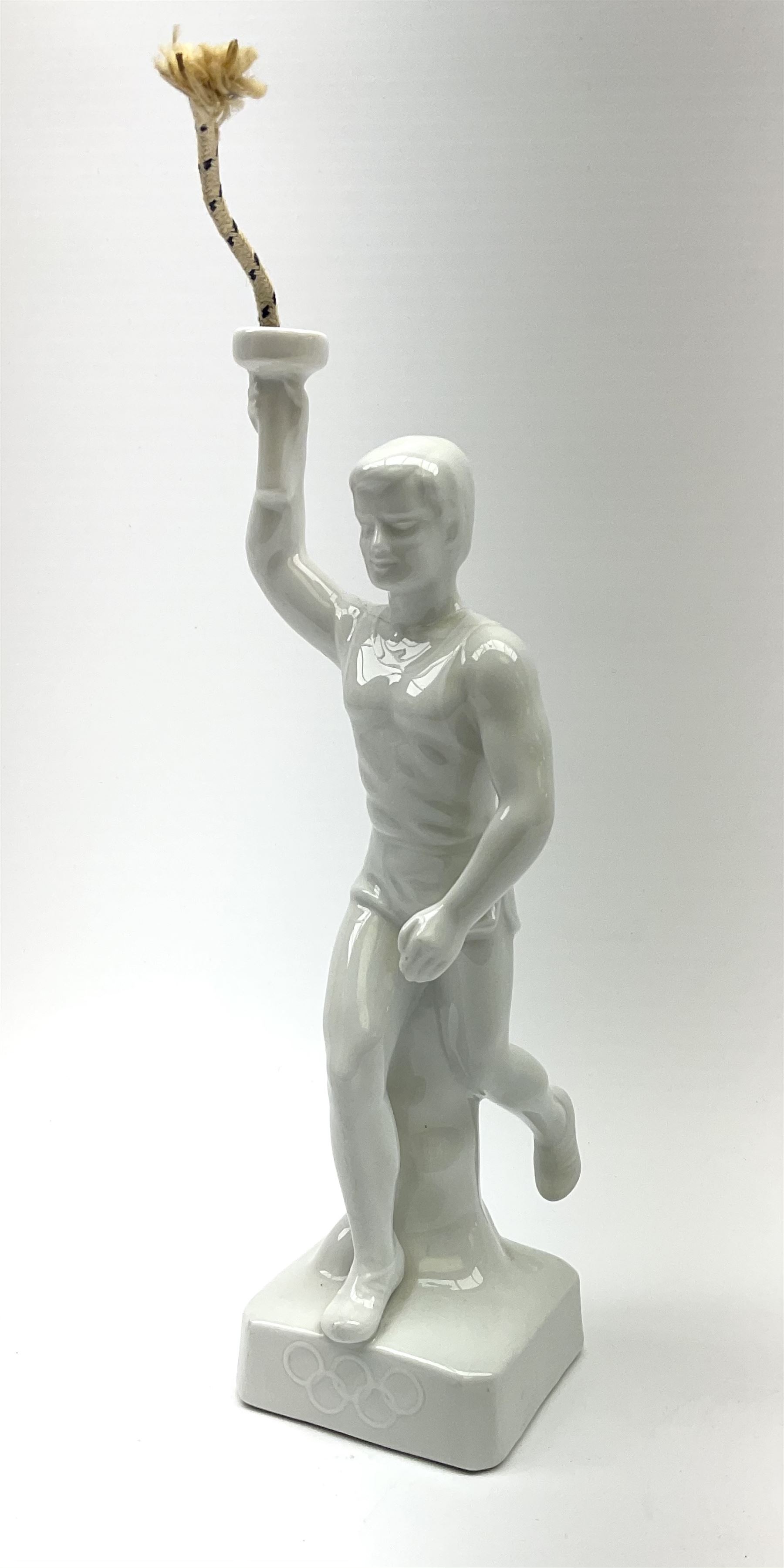 Ceramic Berlin Olympics white glazed figure of a torch bearer