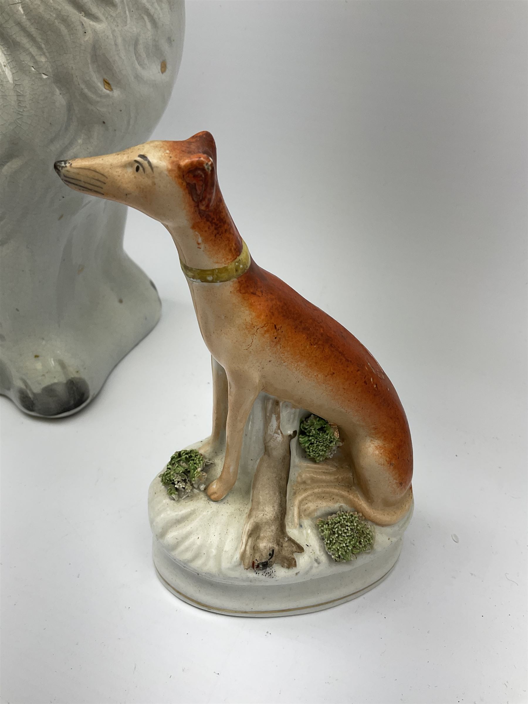 A pair of Victorian Staffordshire white glazed spaniels - Image 4 of 9