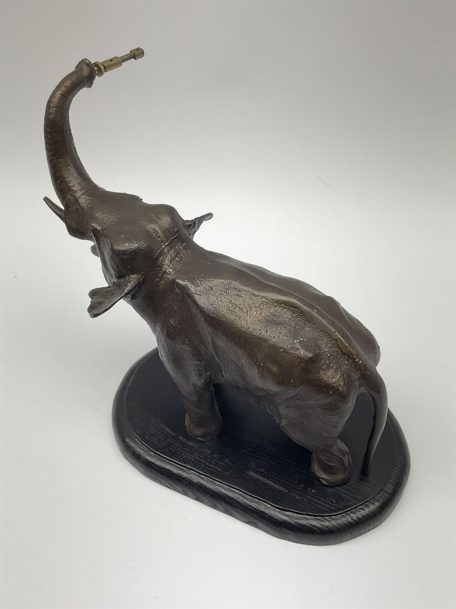 A spelter mystery clock modelled as an elephant supporting the clock upon its trunk - Image 9 of 9